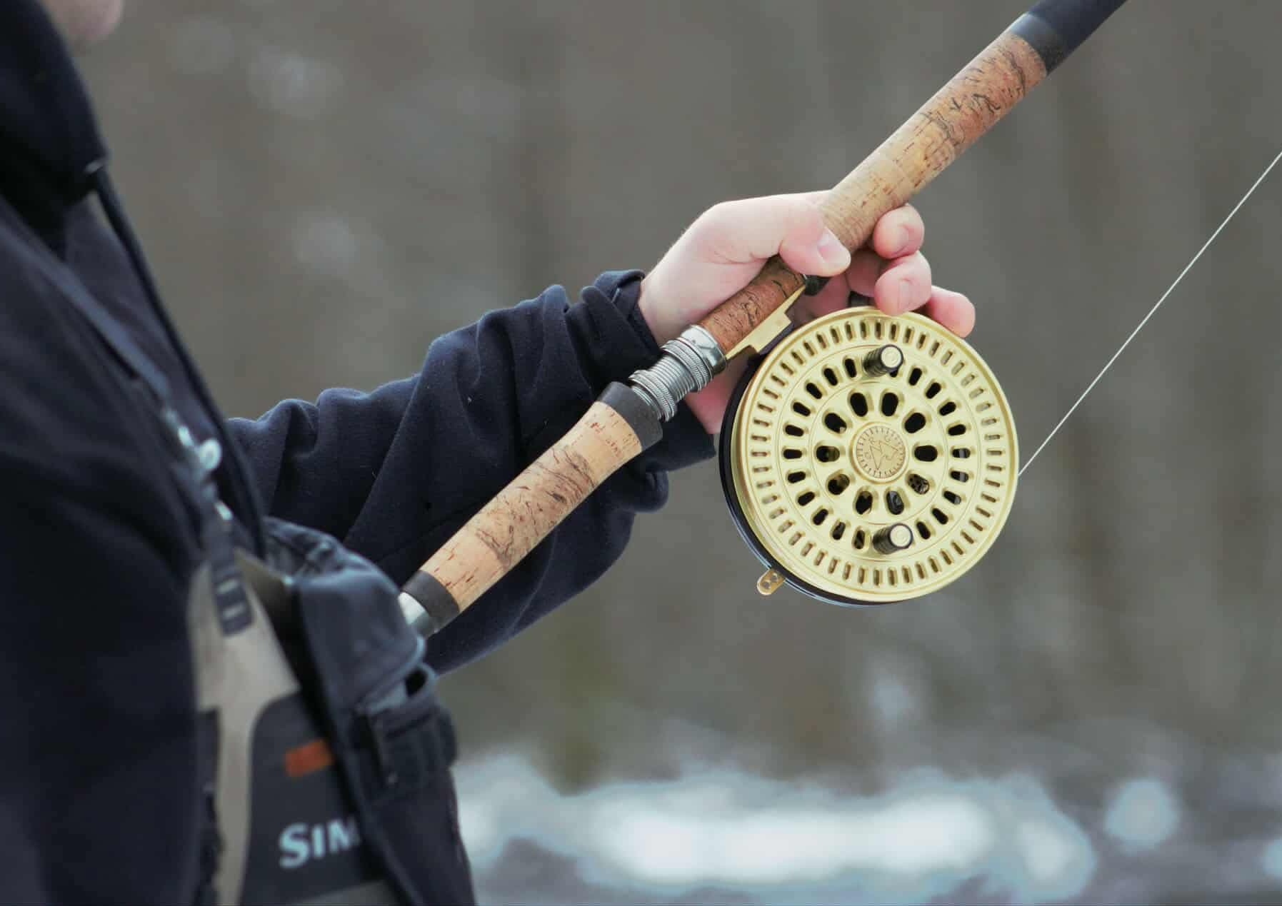 Machined fishing reel components from a low-volume production run