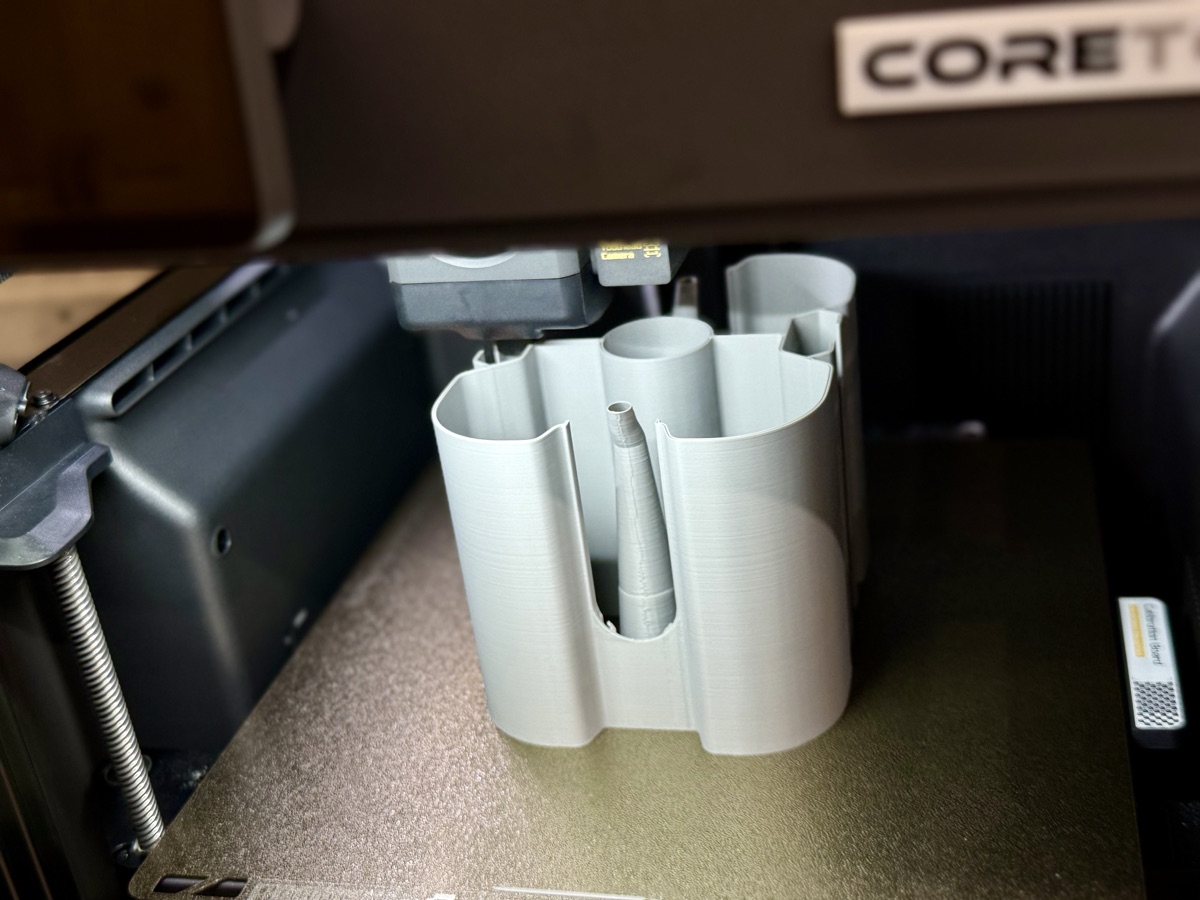 A prototype part being 3D printed at Core Tools