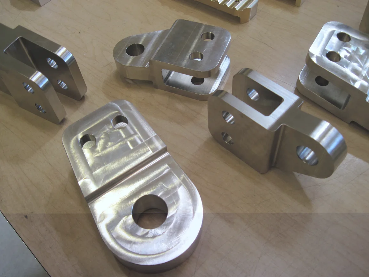 Machined clevis brackets with bored eyes and slotted jaws
